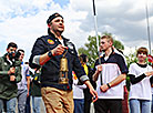 Evgeny Beizak carries a lantern with the 2nd European Games flame