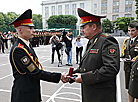 Defense Minister Andrei Ravkov extends greetings to the graduates