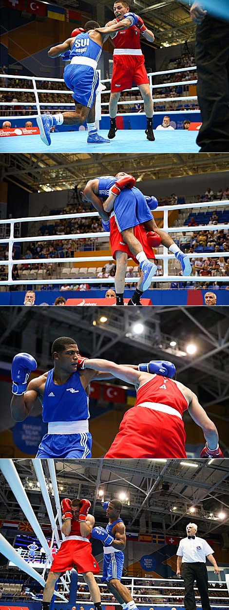 В синей форме боксер из Швейцарии Ангел Року Васкес, в красной форме боксер из Италии Сальваторе Кавалларо