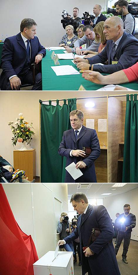 Belarus Deputy Prime Minister Igor Petrishenko casts a vote