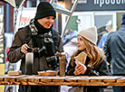 A new Christmas fair in Minsk features a designer New Year tree, a food court with international cuisine and a festival of winter beverages