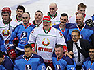 Alexander Lukashenko with participants of the match 