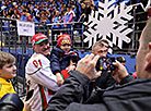 Aleksandr Lukashenko with young ice hockey fans