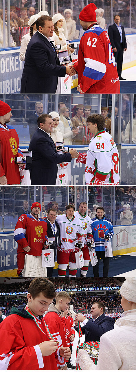 Head of the Presidential Sports Club of Belarus Dmitry Lukashenko hands in the awards to the best players  