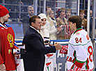 Head of the Presidential Sports Club of Belarus Dmitry Lukashenko hands in the awards to the best players  