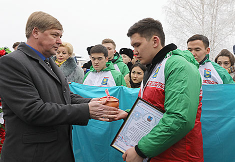 Meeting at the war memorial in the village of Shapury