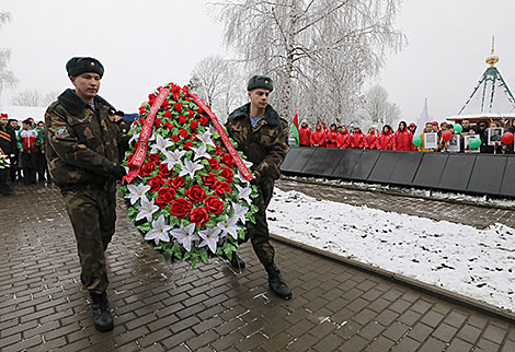 Meeting at the war memorial in the village of Shapury