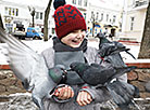 A boy and pigeons 