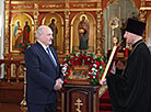 Aleksandr Lukashenko receives a copy of the wonder-working Byzantine icon Patroness