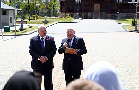 Belarus President Aleksandr Lukashenko and Russian Ambassador to Belarus Dmitry Mezentsev 