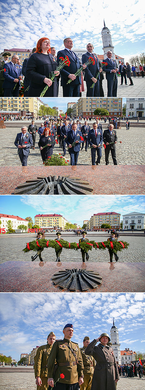 Flowers are laid at the Eternal Fire in Mogilev