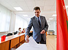 Belarus’ Deputy Prime Vladimir Kukharev takes part in early voting