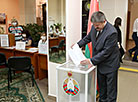 Gomel Oblast Governor Gennady Solovei takes part in voting