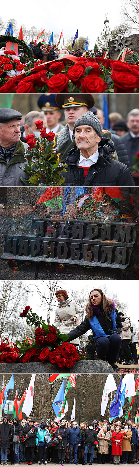 Flowers are laid at the memorial signs For Victims of Chernobyl and Hiroshima Peace Stone in Minsk