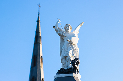 The spire of the Holy Trinity Church is crowned with a 6-meter high cross