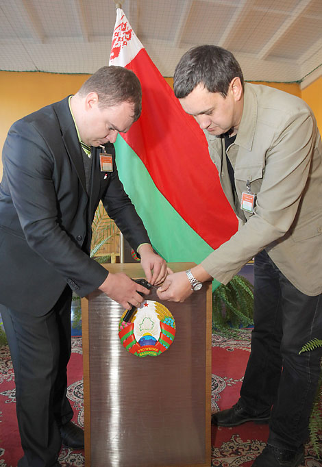 Ballot boxes are sealed and stamped at polling station No. 11 in Polotsk