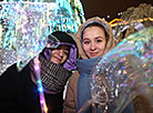 Minsk residents and visitors near the national New Year Tree 