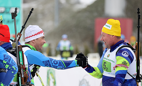 Belarusian biathletes Alexandr Syman and Pyotr Ivashka compete in the Champions Race in Raubichi