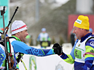 Belarusian biathletes Alexandr Syman and Pyotr Ivashka compete in the Champions Race in Raubichi