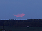 Penumbral lunar eclipse and a flower moon over Grodno