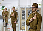 Photo exhibition Destinies Folded into Triangle in the lobby of the Palace of the Republic