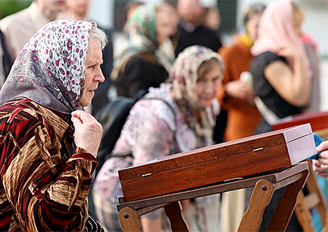 Parishioners near the Holy Spirit Cathedral in Minsk