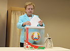 CEC head Lidia Yermoshina casts her vote early