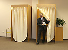 Belarus Premier Andrei Kobyakov casts his ballot 