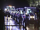 Belarus tractors put on a stunning dance show near a Christmas tree