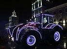 Belarus tractors put on a stunning dance show near a Christmas tree