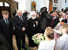 Belarus President Alexander Lukashenko lights Christmas candle in Holy Spirit Cathedral in Minsk