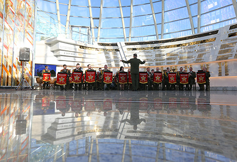 British pipers and the orchestra of the Armed Forces of Belarus perform in the Museum of the Great Patriotic War