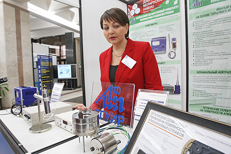 Svetlana Belan presents an exposition of the Belarusian State University of Informatics and Radioelectronics