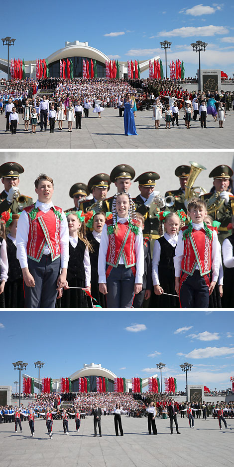 Thousands join the singing of the National Anthem in National Flag Square