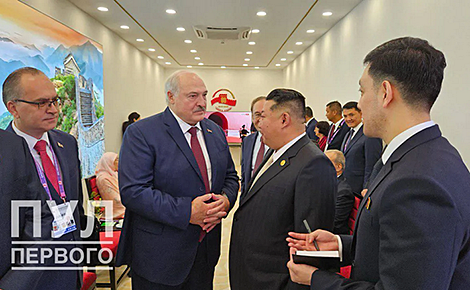 Lukashenko talks with North Korean leader Kim Jong Un before parade in Beijing