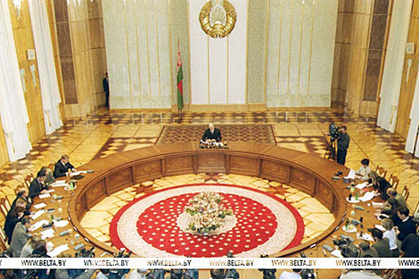 Time to gather stones to build our temple. From what did Lukashenko protect Belarus in early 2000s?
