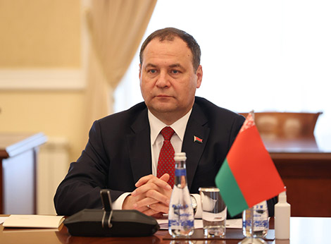 Western sanctions drive Belarus, Russia closer to each other, prime minister says