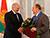 Lukashenko presents Order of Friendship of Peoples to Zyuganov