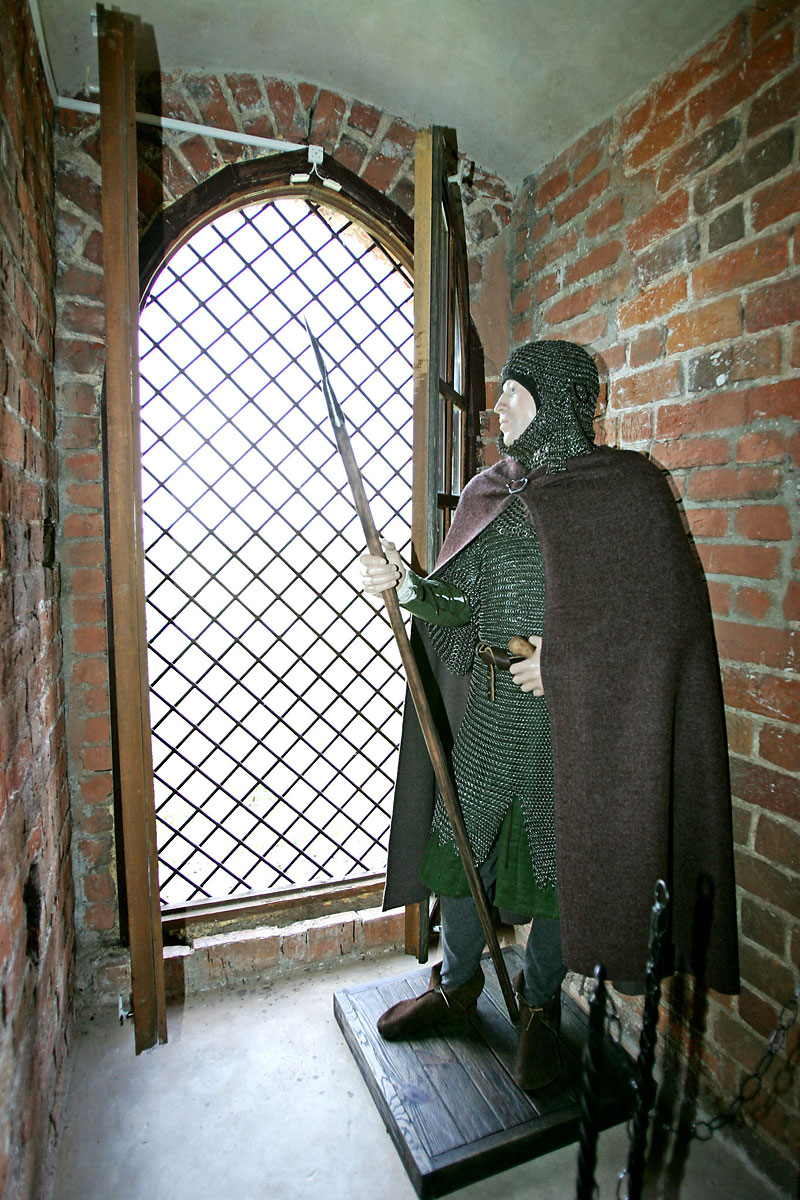 Knight standing at the window of the Kamenets Tower