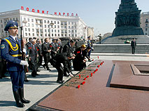 A flower-laying ceremony at Victory Square