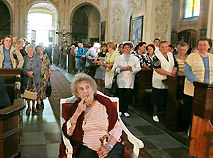 Duchess Elzbieta Radziwill Tomaszewska attends a church service in Nesvizh
