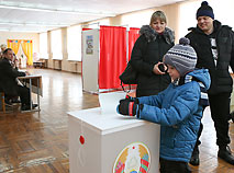 Voting has become a family experience in Belarus as children accompany their parents to the polls
