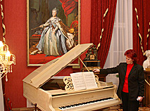 Grand piano of the late XIX - early XX century in Red Living Room